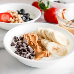 Yogurt bowls with fruit and peanut butter