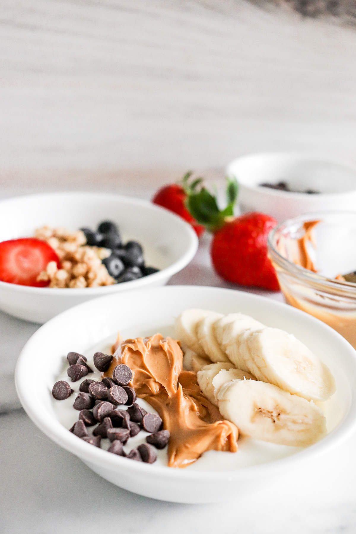 Yogurt bowls with fruit and peanut butter
