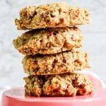 Stacked carrot cookies on a platter.