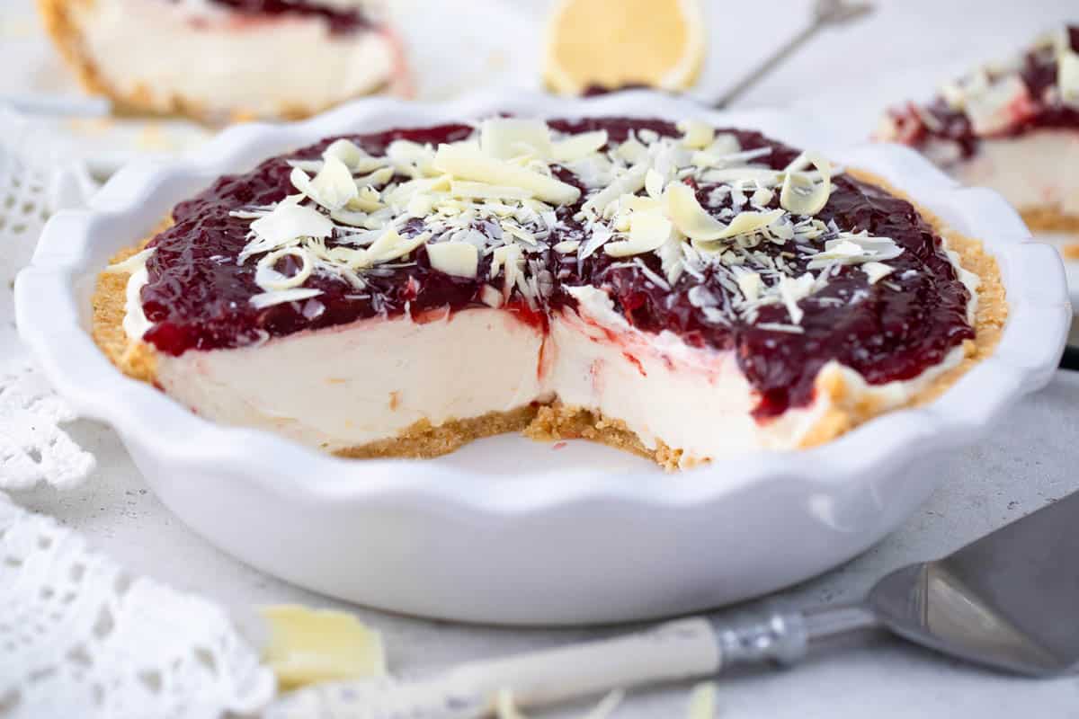 No Bake Cherry Cheesecake with a couple slices cut out